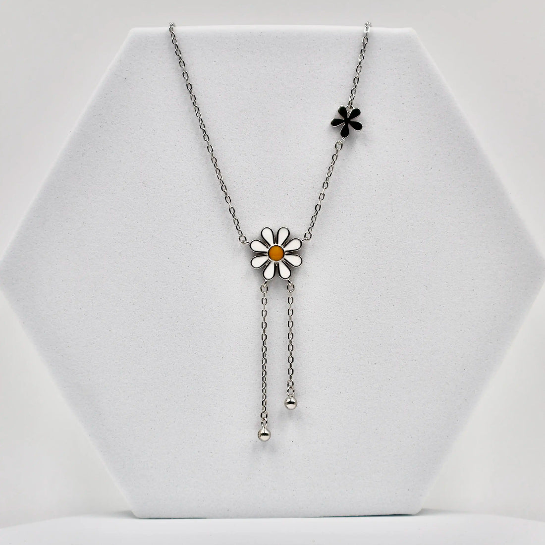 92.50 Silver Flower pendent with two hanging balls chain